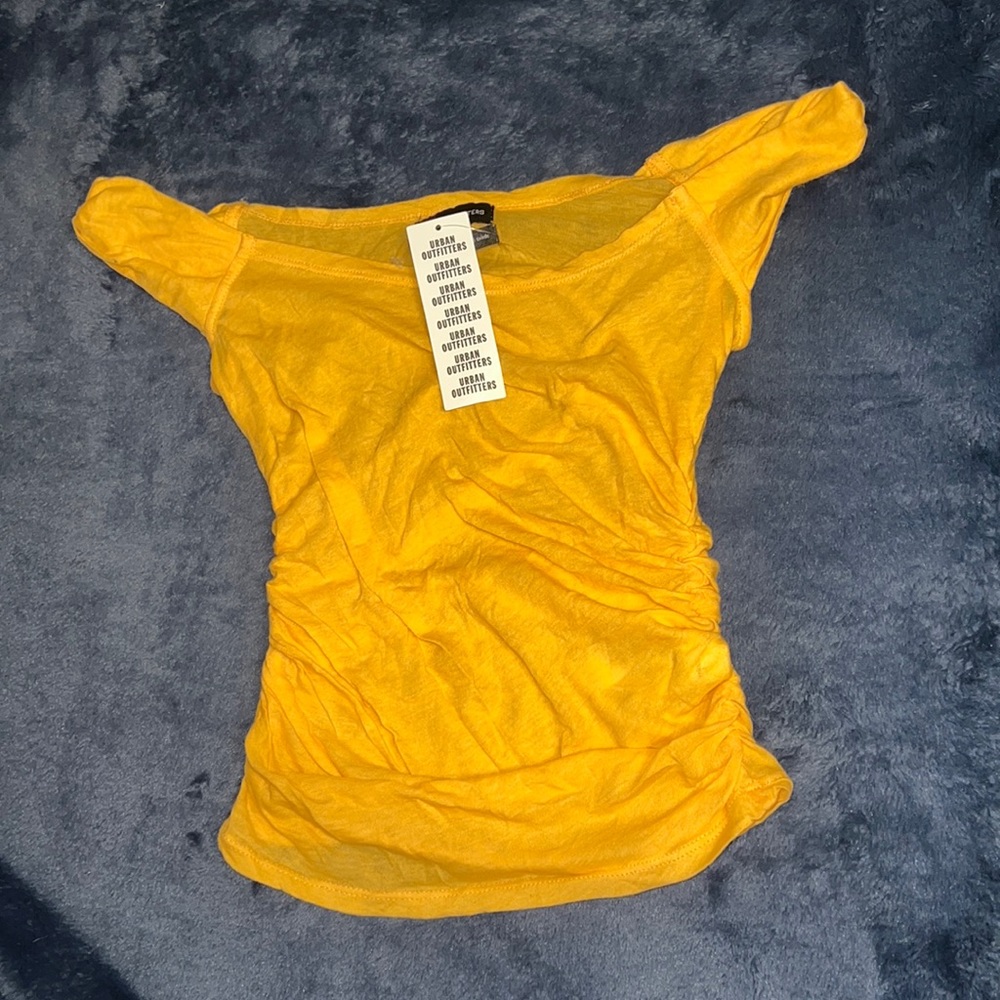 Orange tank top.